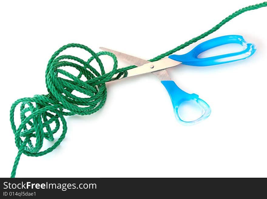 Green cord and steel scissors.