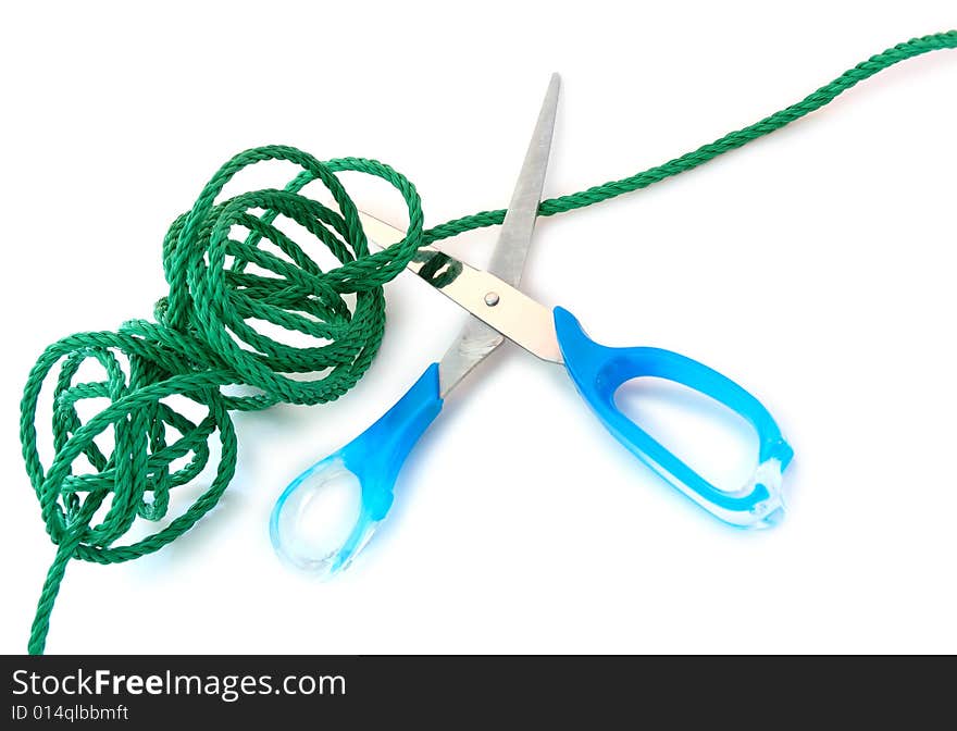 Green cord and steel scissors.