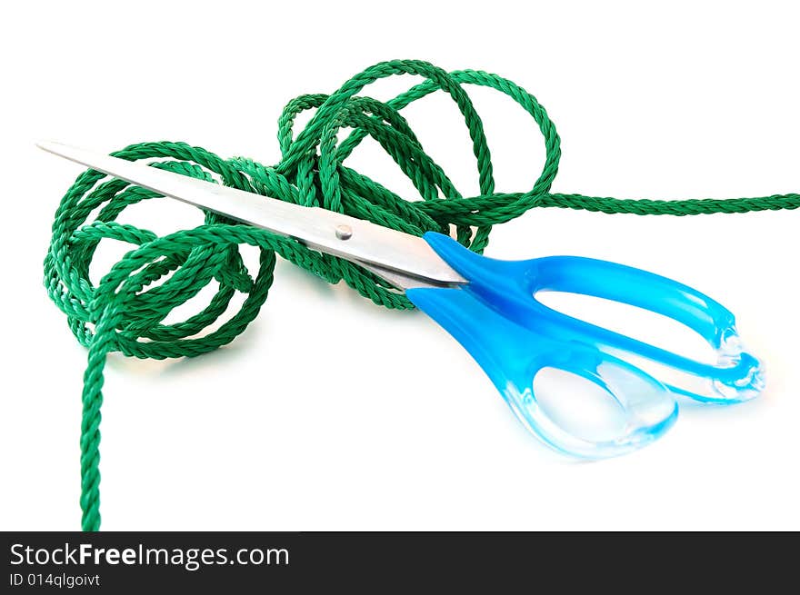 Green cord and steel scissors.