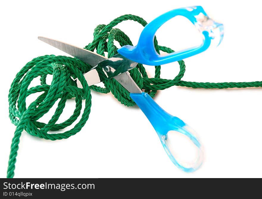 Green cord and steel scissors.