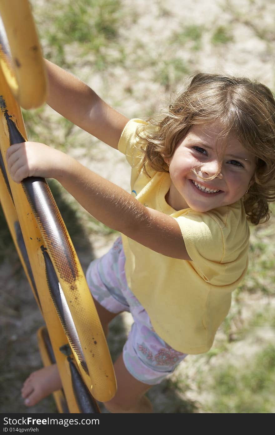 A picture of a cute little girl smiling. A picture of a cute little girl smiling