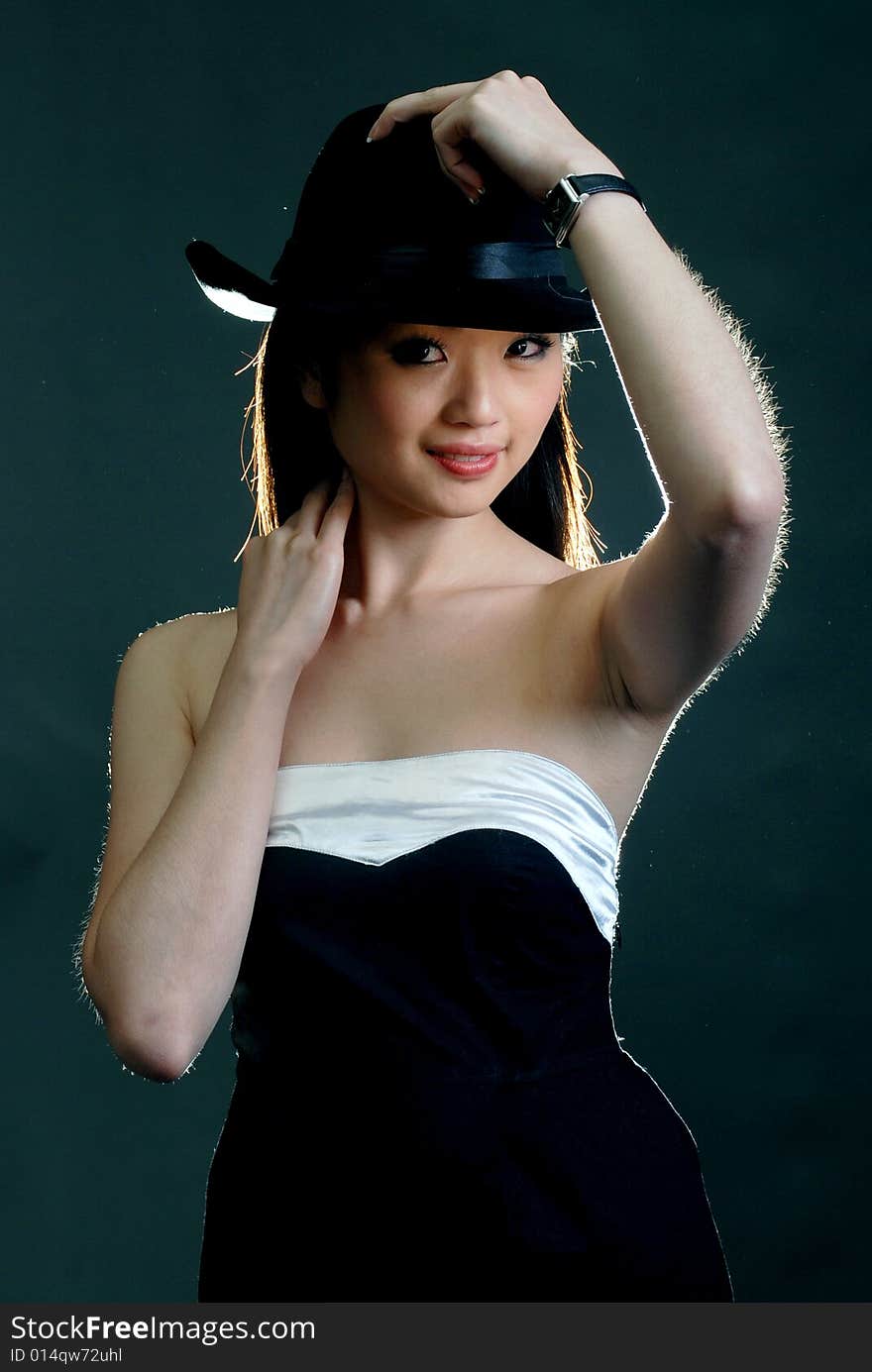 Pretty asian girl image at the studio background