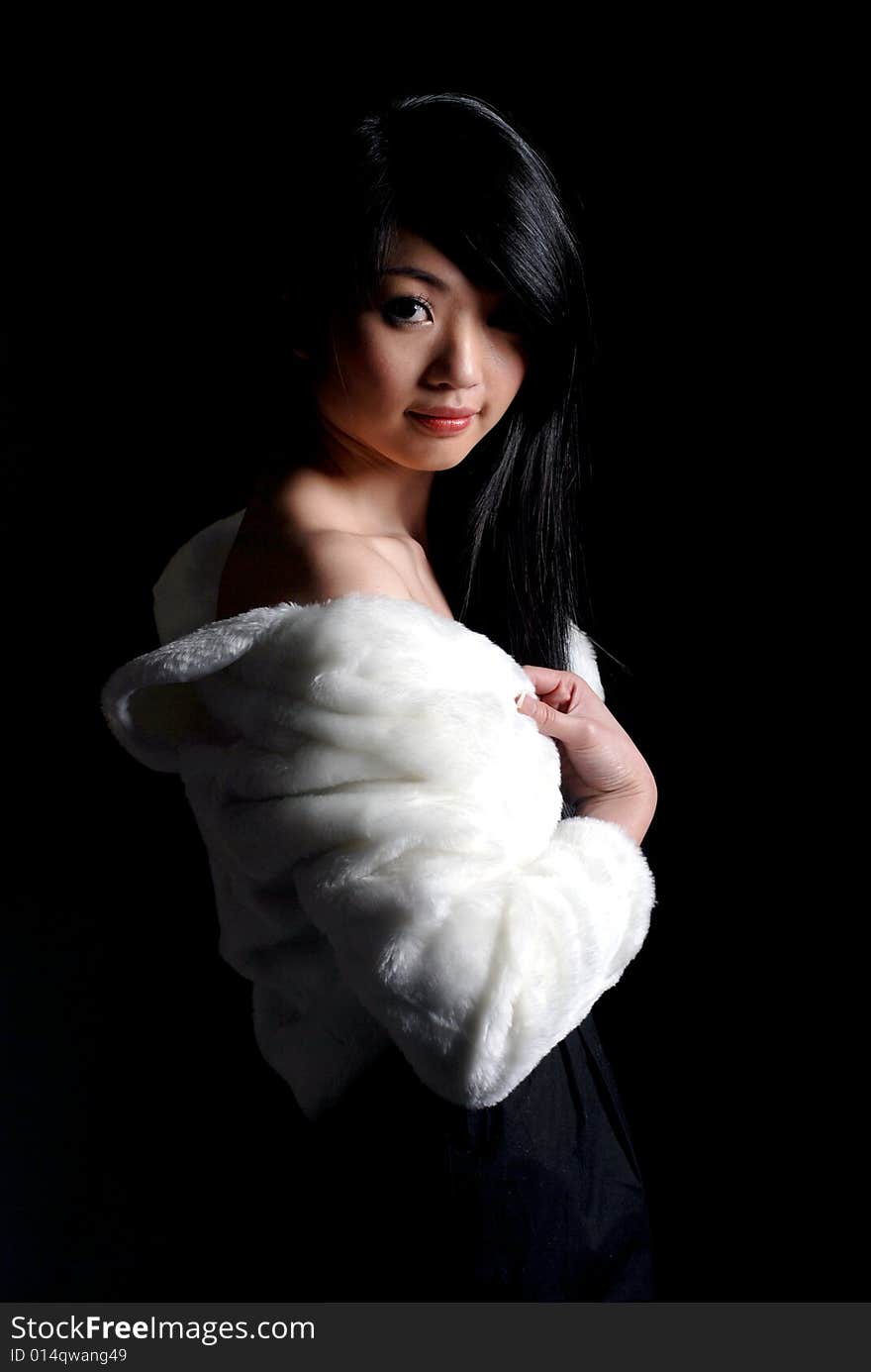 Pretty asian girl image at the studio background