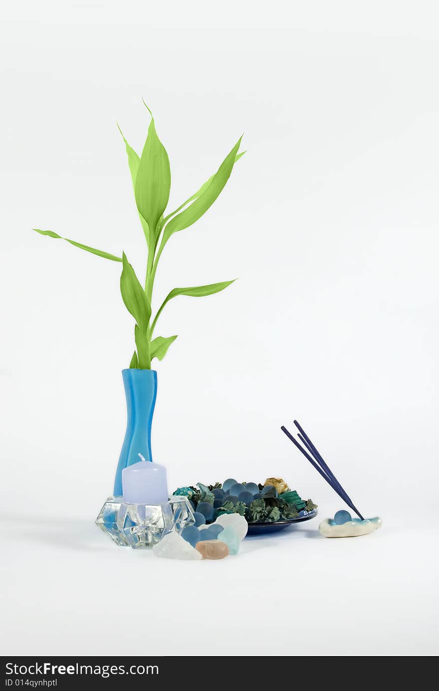 Aromatherapy objects for spa:blue stones,aroma sticks,candle,lucky bamboo,more spa photos in <a href=http://www.dreamstime.com/spaaromatherapy-massage-rcollection8215-resi828293>Spa,aromatherapy ,massage</a>