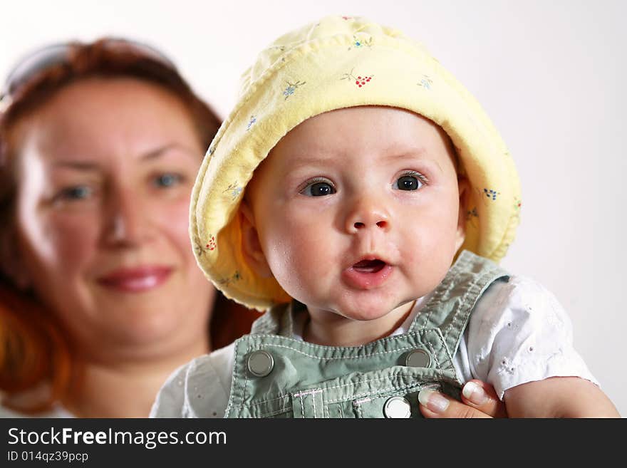 A woman with a baby in her hands. A woman with a baby in her hands