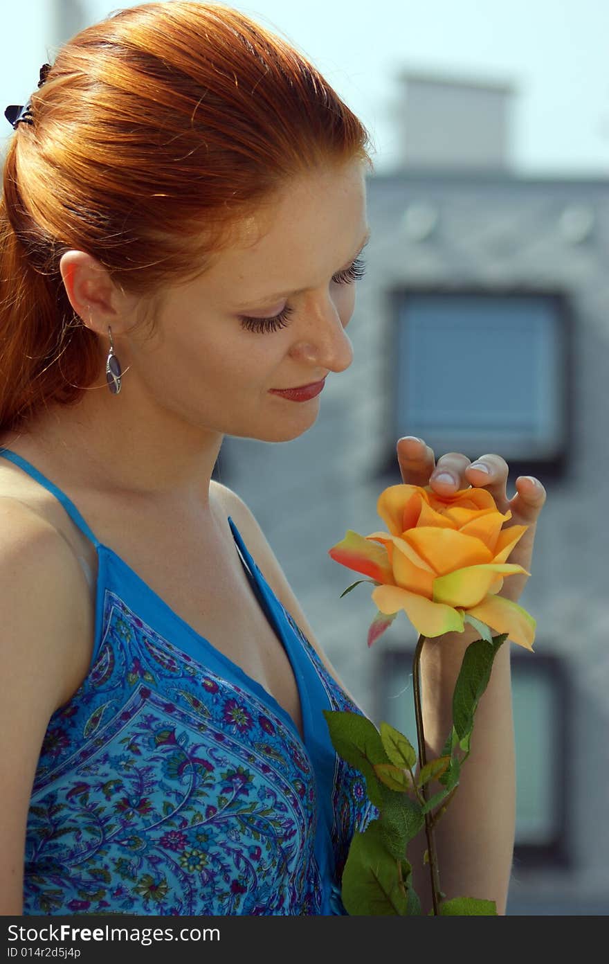 Young girls with a yellow rose