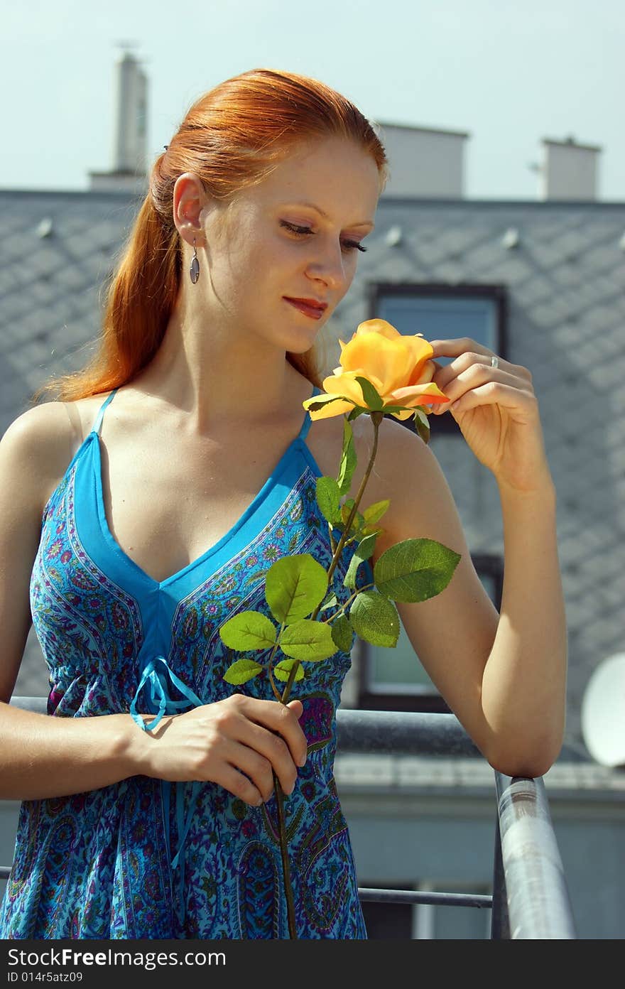 Young Girls With A Yellow Rose