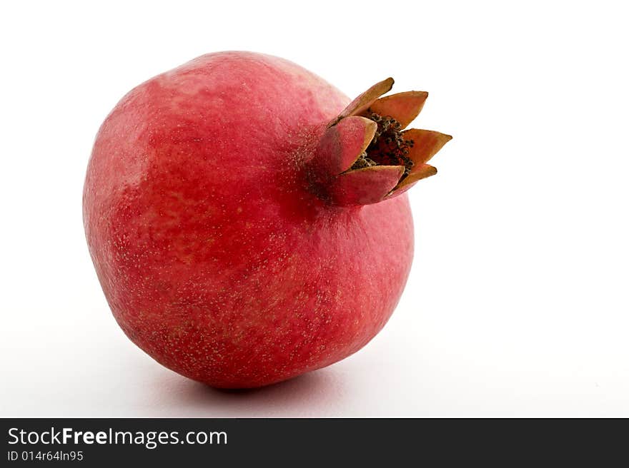 Whole  pomegranate isolated on white