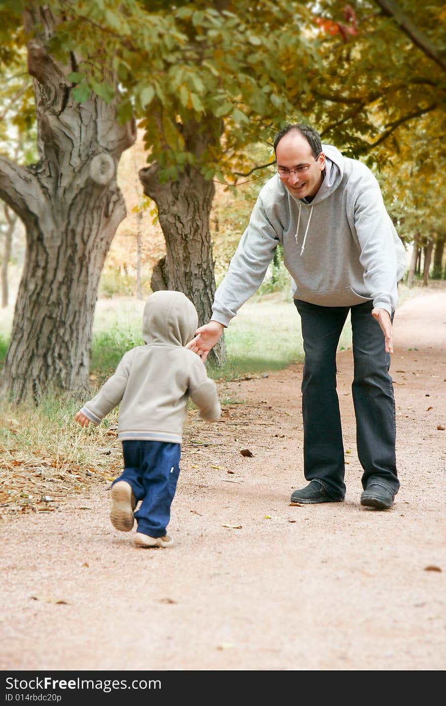 Father And Son In Park