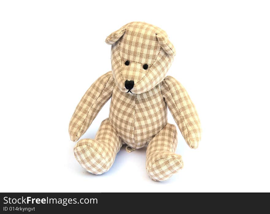 Cute fabric bear on a white background. Cute fabric bear on a white background