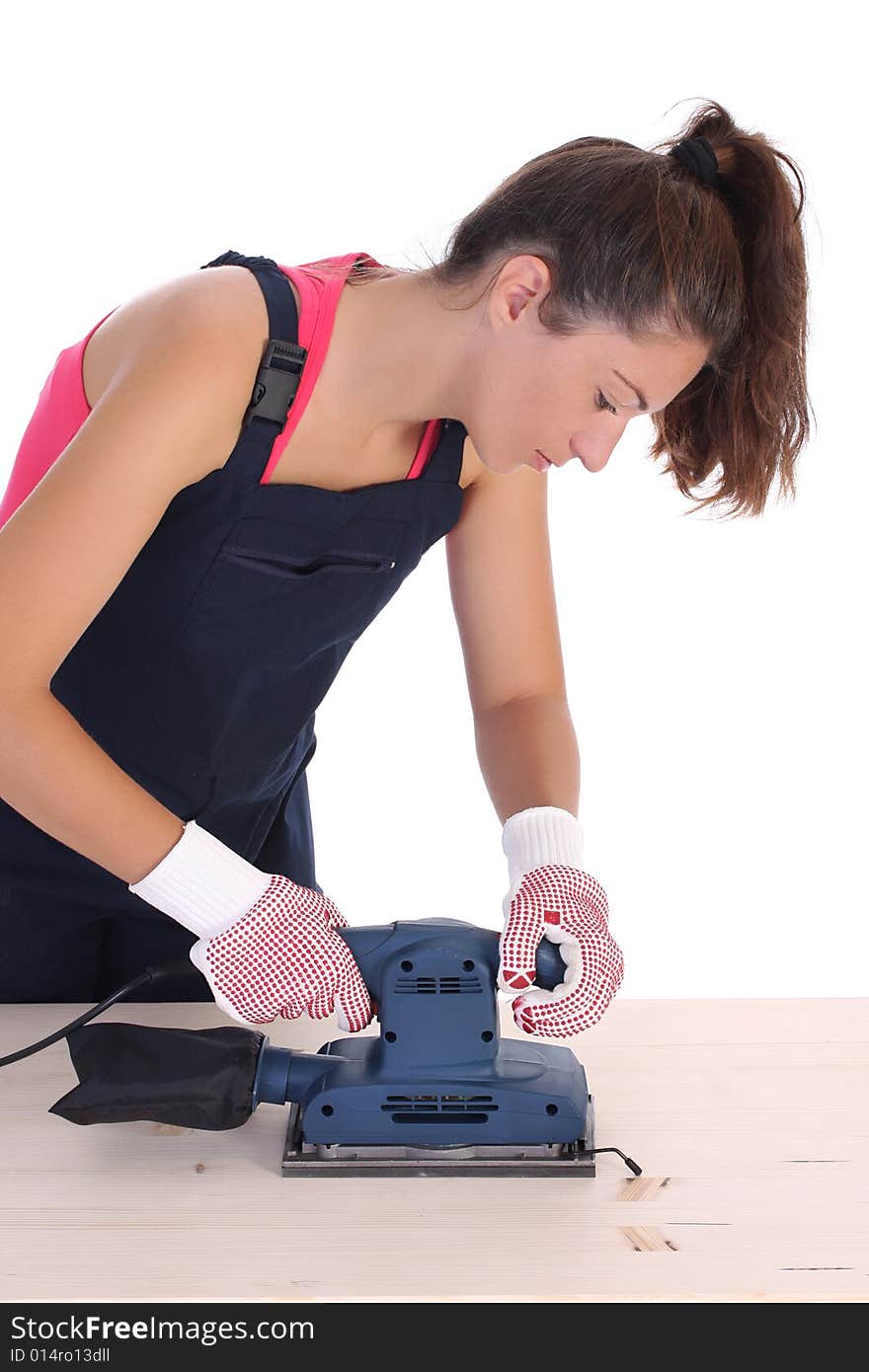 Woman carpenter at work on white background