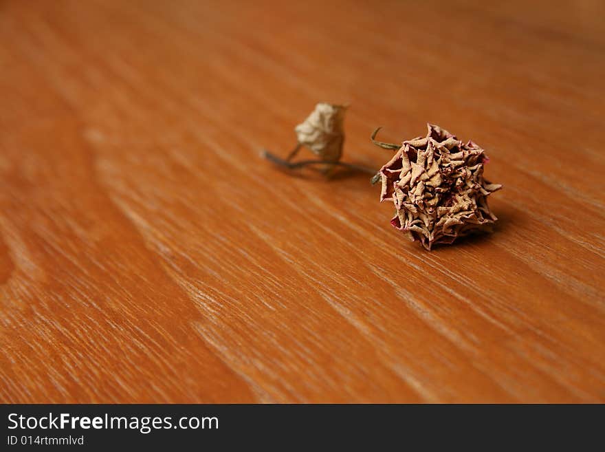 Rose On Wooden Surface