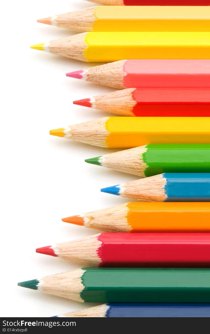 Colorful pencils on white background