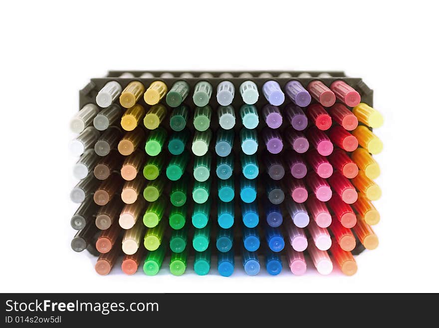 A stack of colorful markers against a white background. A stack of colorful markers against a white background