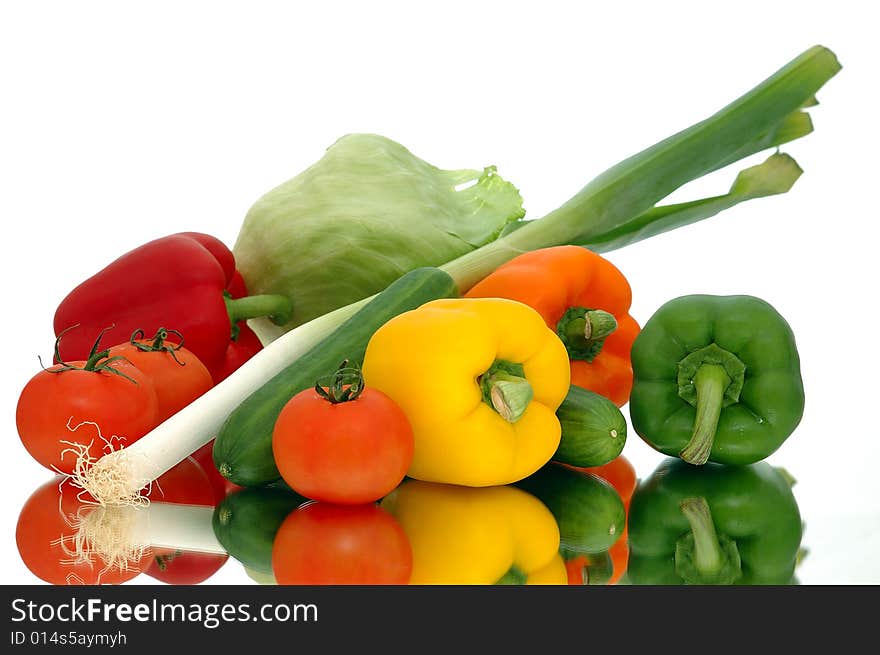 Fresh vegetables on glass and white background