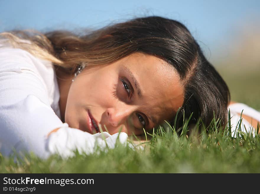 Sweet woman rest on the grass. Sweet woman rest on the grass