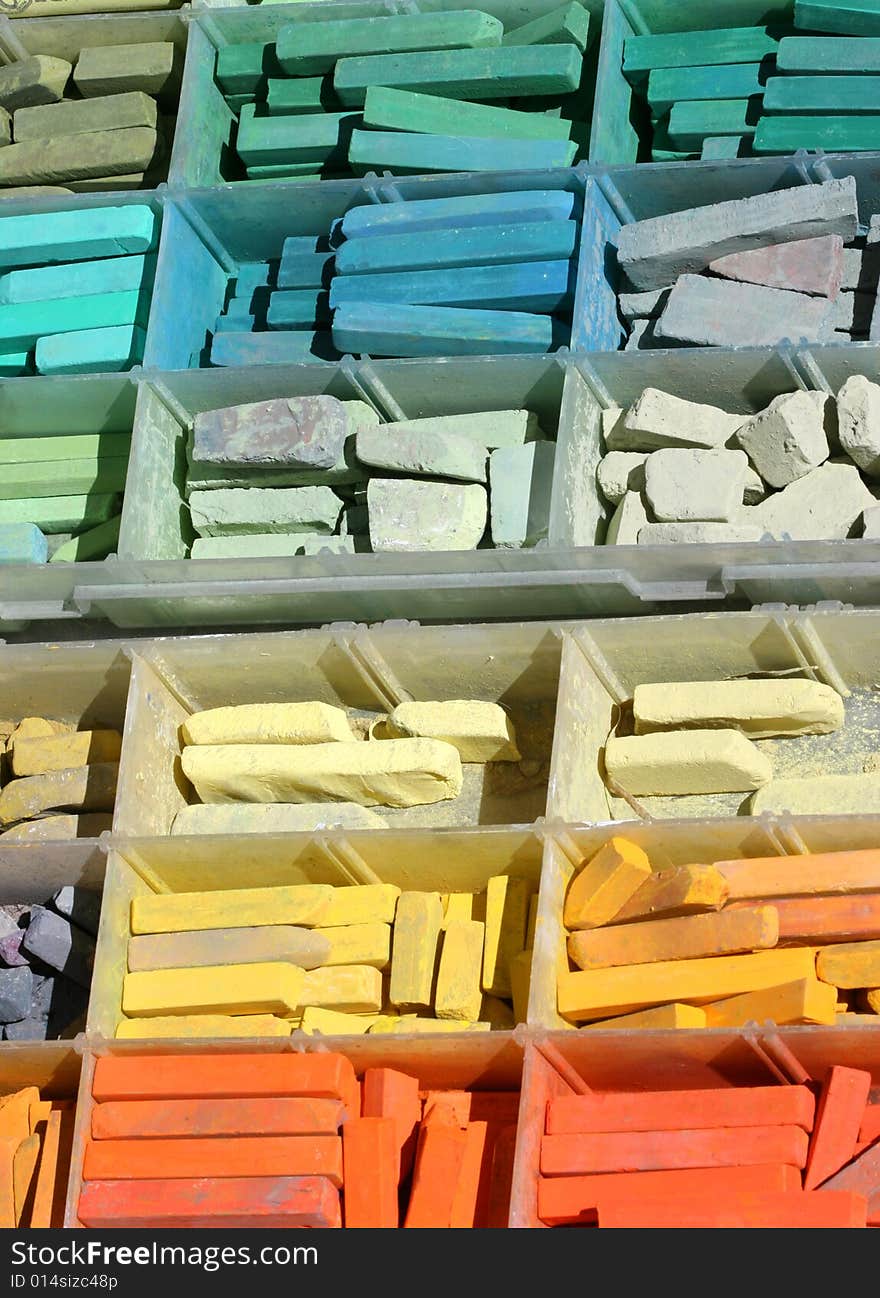 Colorful chalk ready for a street painter. Colorful chalk ready for a street painter