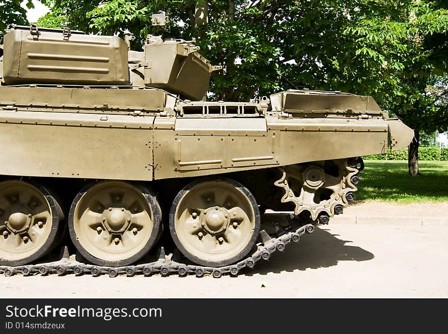 A closeup of tracks of an old military vehicle. A closeup of tracks of an old military vehicle