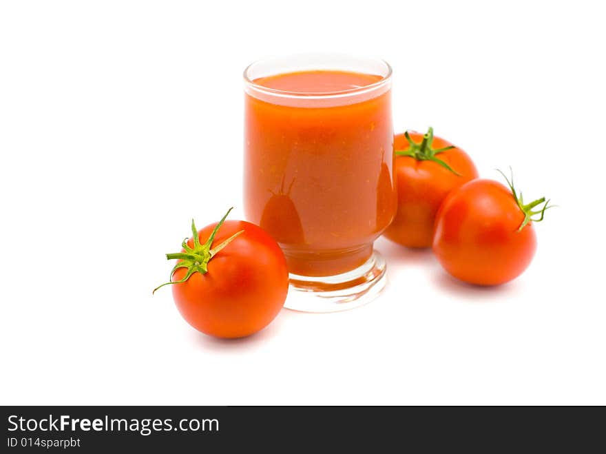 Fresh tomato juice and tomatoes on a white background. Fresh tomato juice and tomatoes on a white background