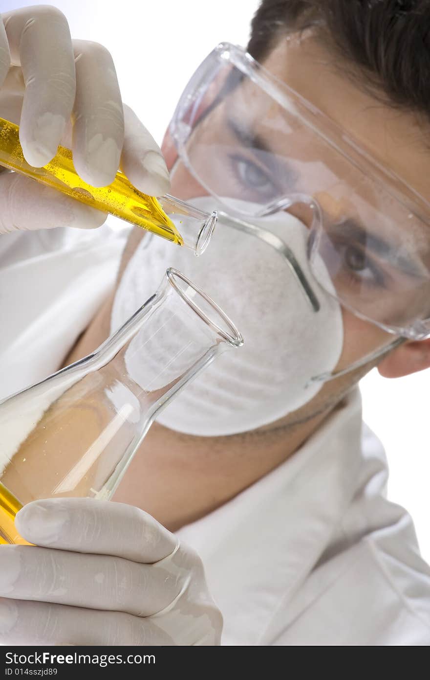 Young scientist working with mask