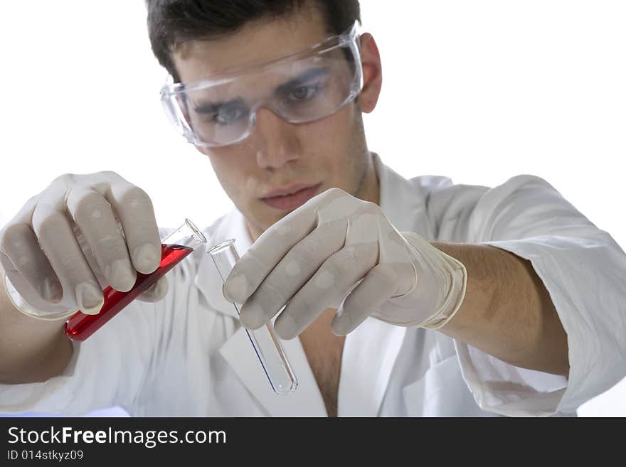 Young scientist working in a laboratory. Young scientist working in a laboratory