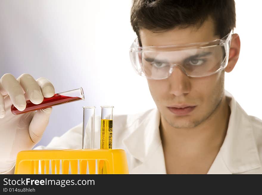 Young scientist working in his laboratory