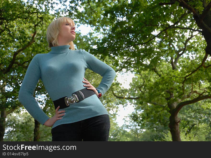 Beautiful blond young lady portrait in woods. Beautiful blond young lady portrait in woods