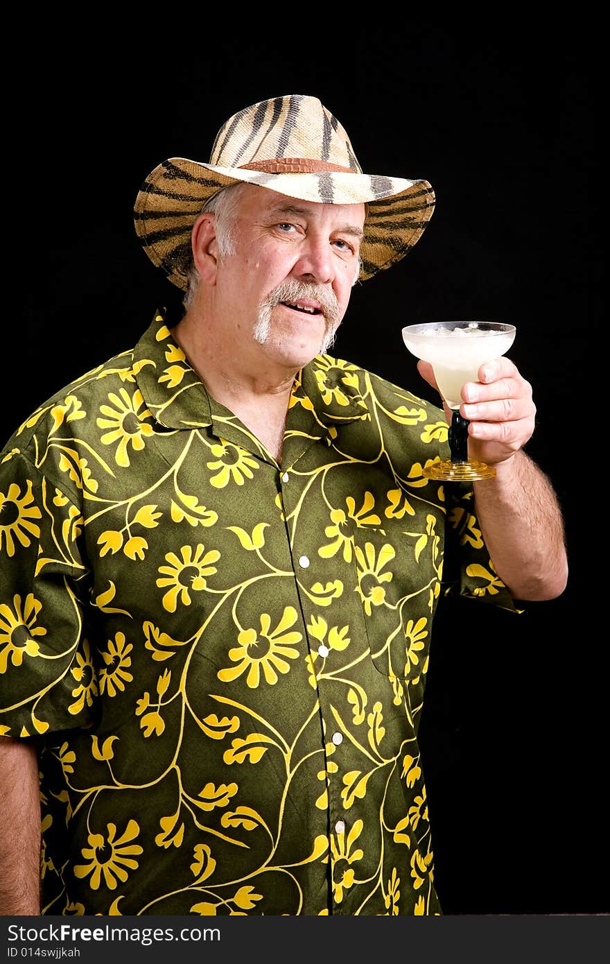 Older man giving a toast with a frozen drink. Older man giving a toast with a frozen drink.