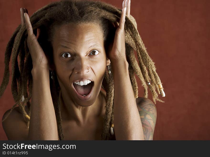 Shocked African American Woman with Hair in Dreadlocks