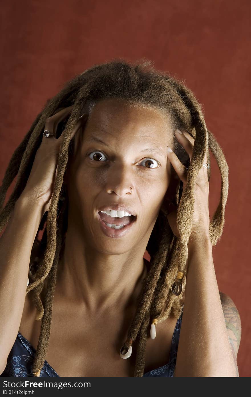 Shocked African American Woman with Hair in Dreadlocks