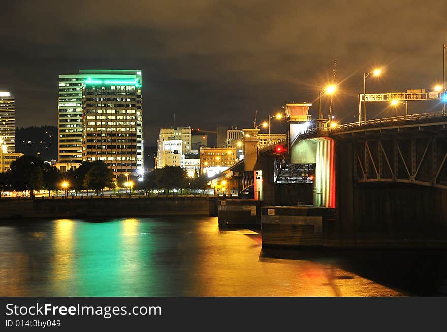 Bridge at night full of lights and refection