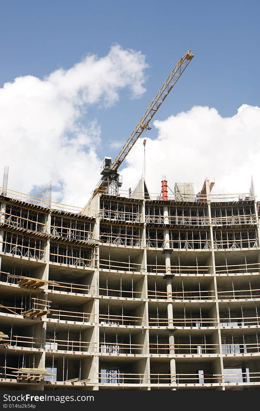 Crane At A House Over Construction