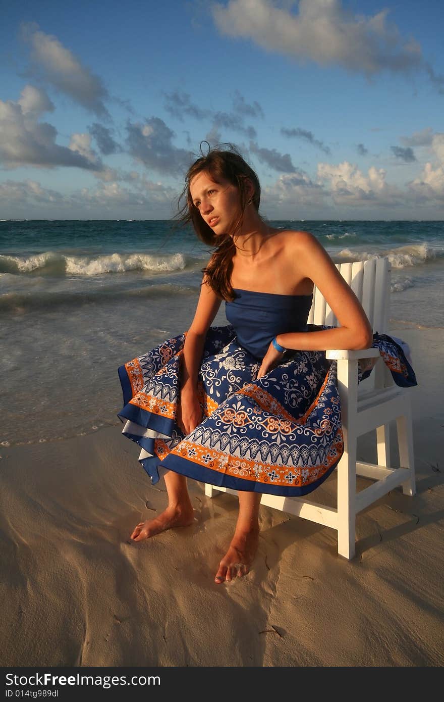 Attractive young woman and ocean