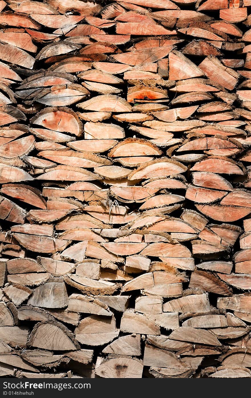 Wood logs wall showing its detailed texture. Wood logs wall showing its detailed texture