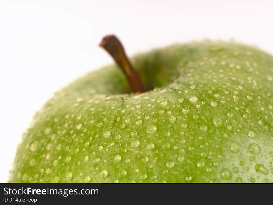 Green apple on a white background