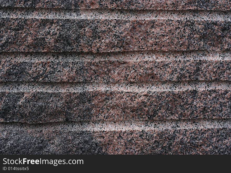 Granite red block with boreholes - to apply at background