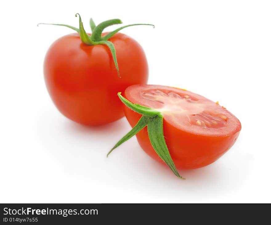 Red tomato isolated on white background.