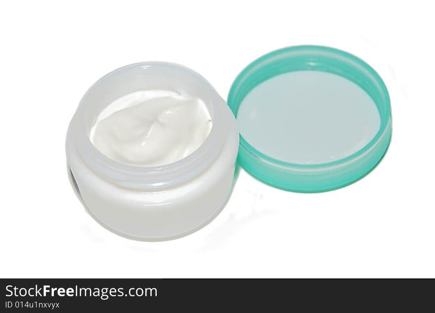 White cosmetic cream opened box isolated over white. White cosmetic cream opened box isolated over white