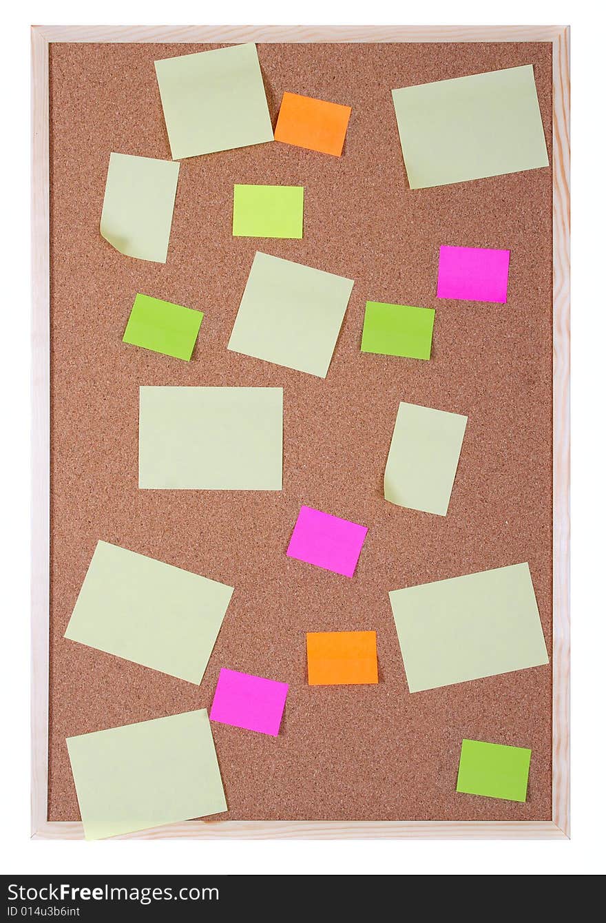 Pieces of note paper on a cork bulletin board