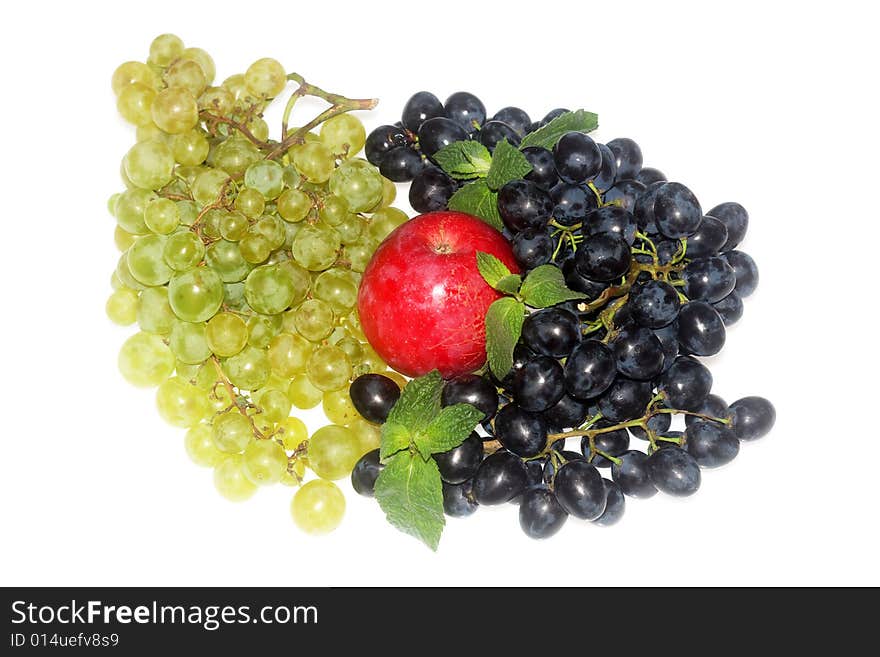 Green and red grapes and apple