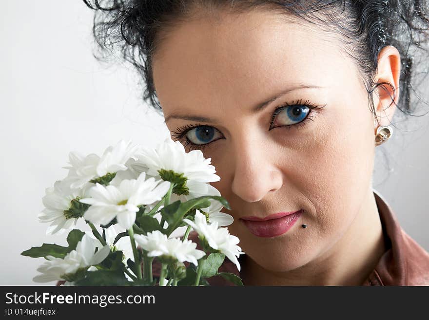 An image of nice woman with white flowers. An image of nice woman with white flowers