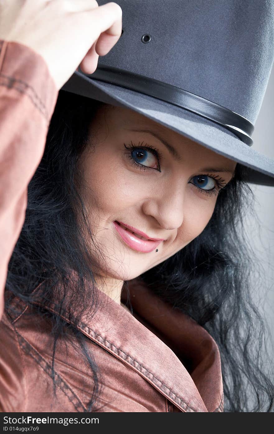 An image of nice woman in grey hat