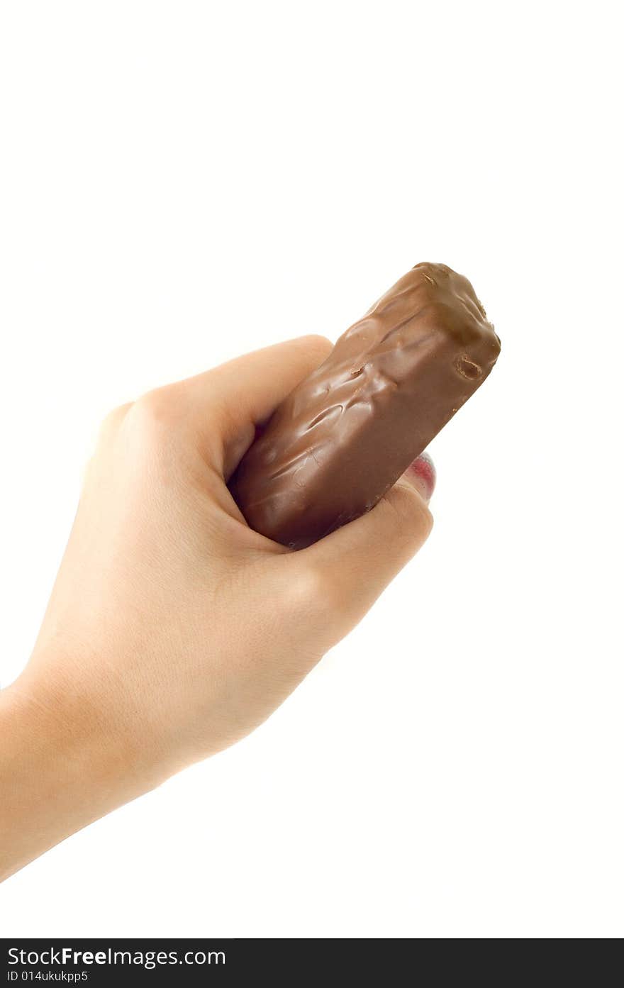 Female hand hold bar of chocolate on white background