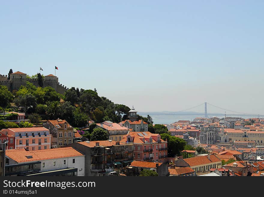 Lisbon view on where it sees the castle of S. Gorge, the Tagus River and the bridge on April 25. Lisbon view on where it sees the castle of S. Gorge, the Tagus River and the bridge on April 25