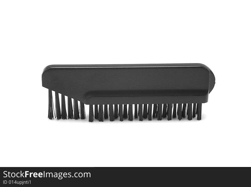 Small cleaning brush for electric shaver isolated on white