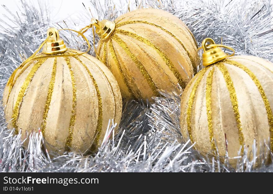 Three golden christmas balls