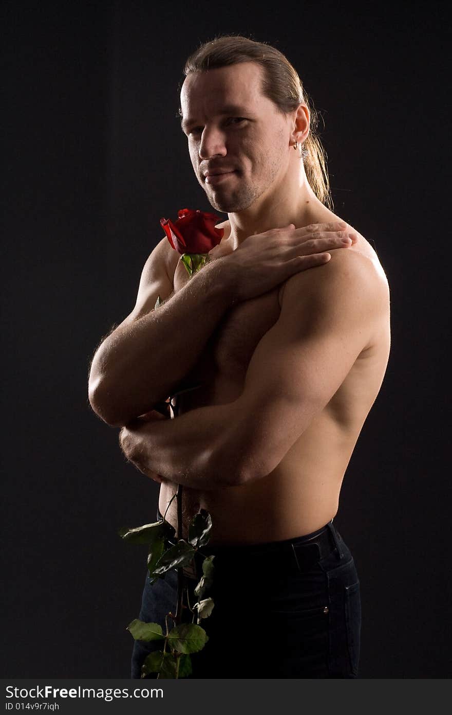 Standing romantic man with red rose. Standing romantic man with red rose