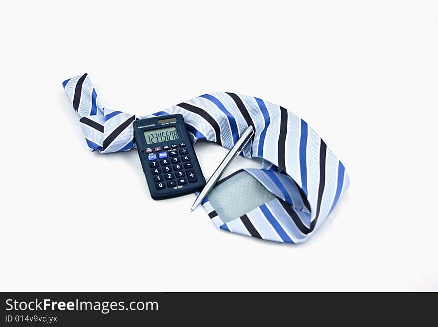 Calculator, tie and pencil