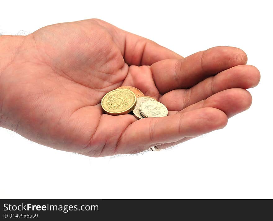 Hand holding British currency