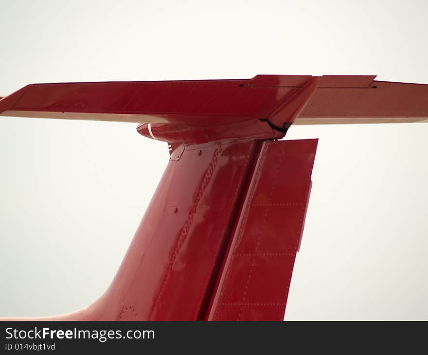 Russian jet training red plane tail close-up. Russian jet training red plane tail close-up